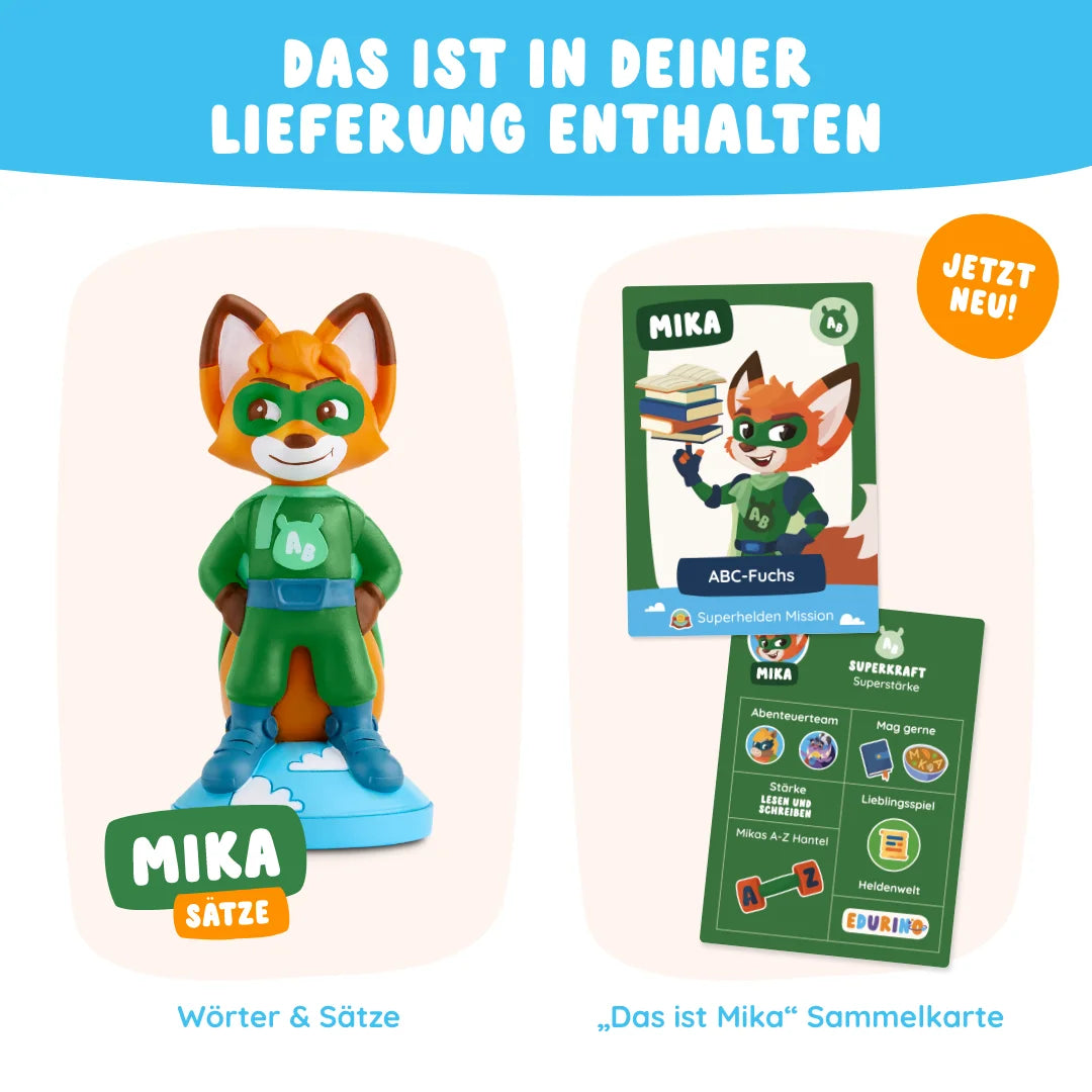 Das Edurino DE Mika "Wörter & Sätze" Set enthält eine Fuchs-Superheldenfigur und zwei Karten - eine mit dem Fuchs, eine mit bunten Symbolen - auf weißem Hintergrund.